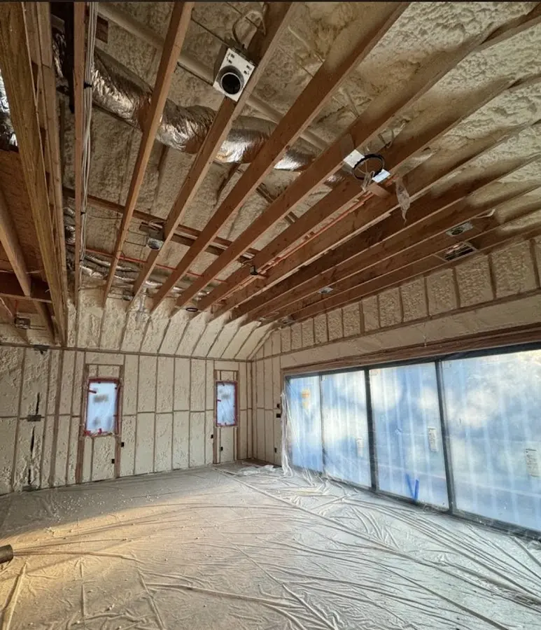 Interior walls and ceiling insulated with spray foam during new construction in Jupiter Farms